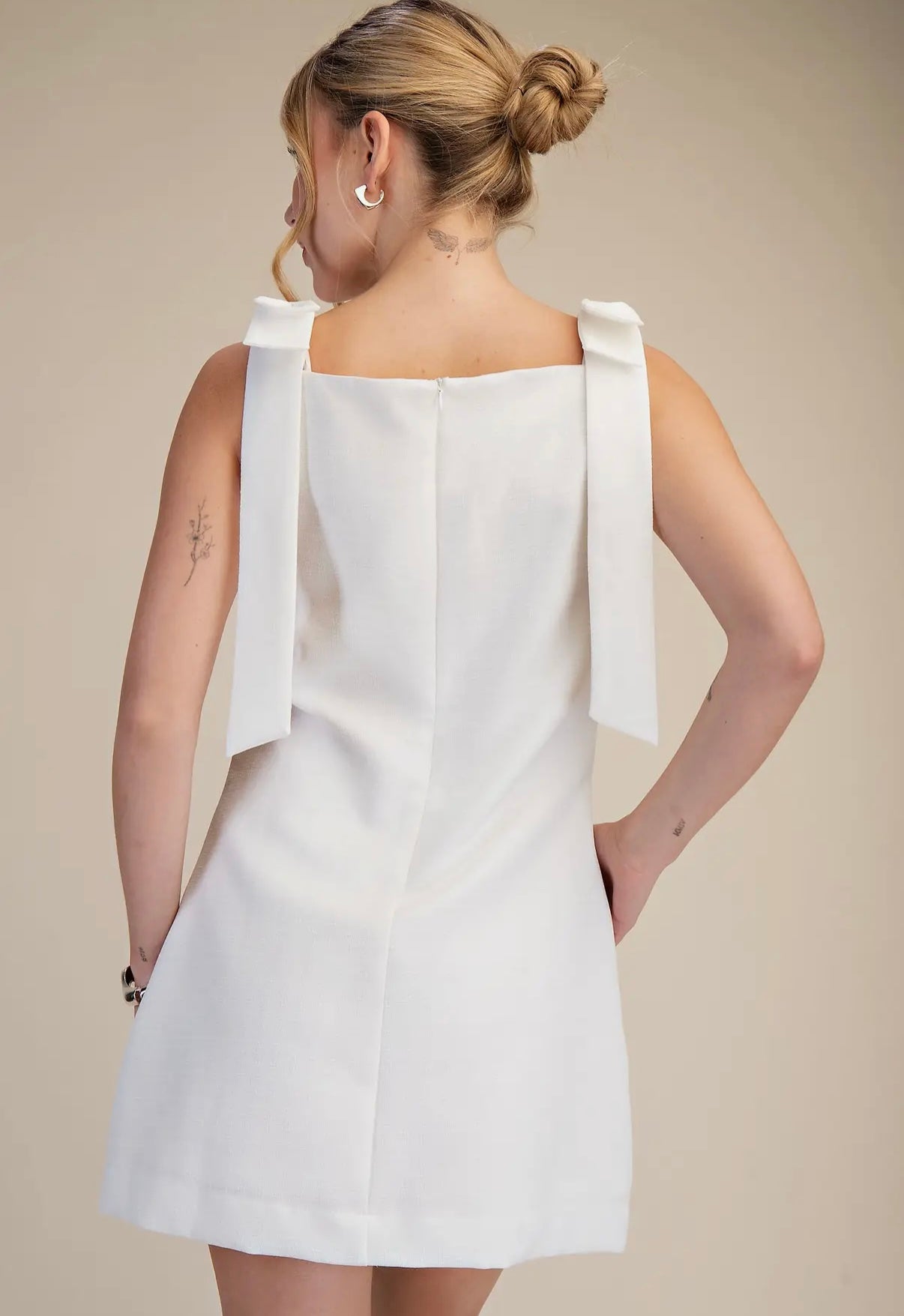 White bow strap dress