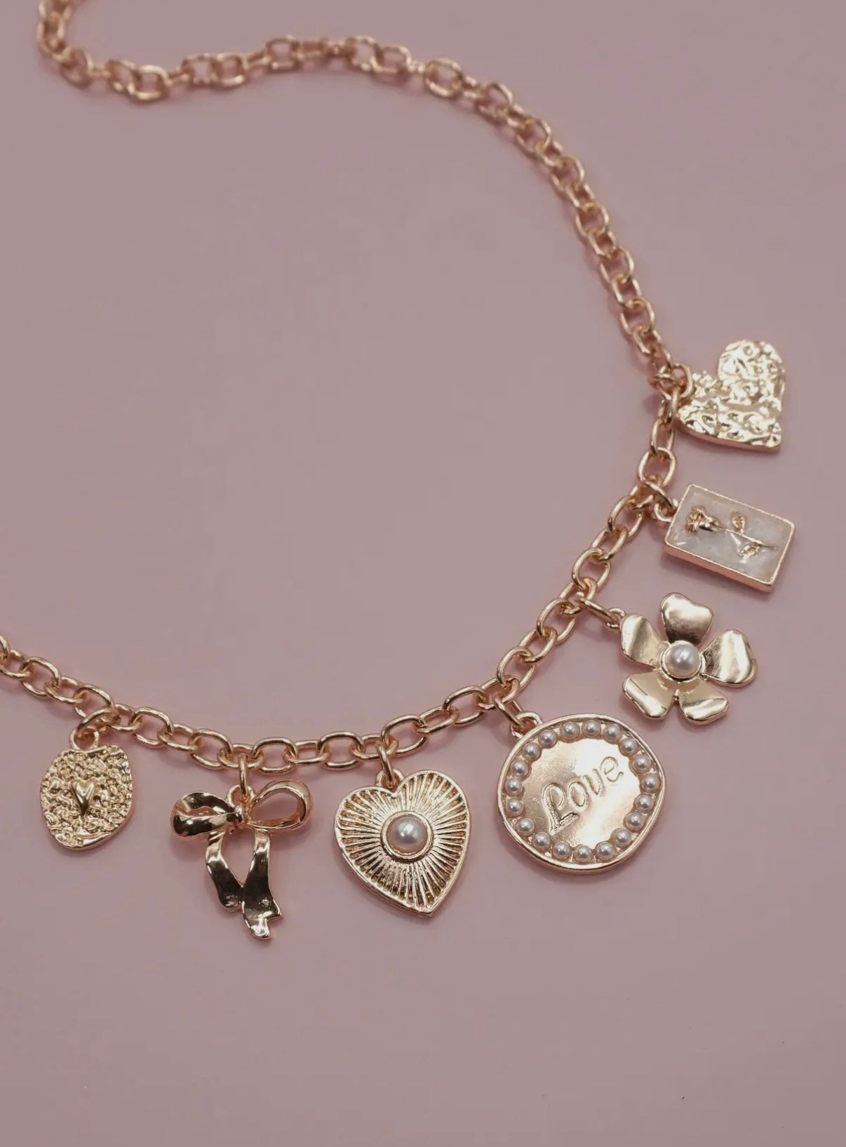 Gold love charm necklace