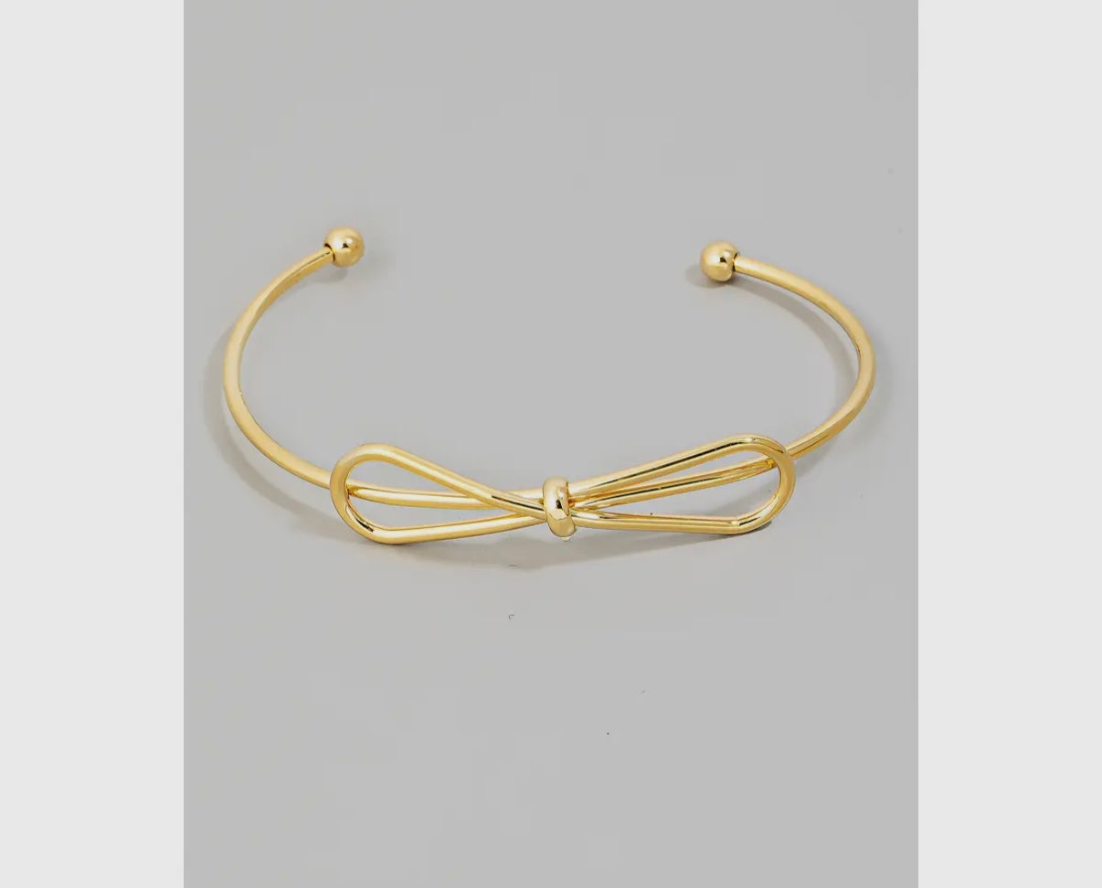 Gold bow cuff bracelet