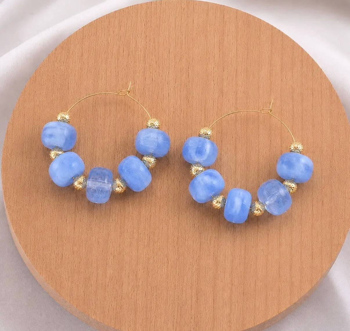 Blue beaded hoops