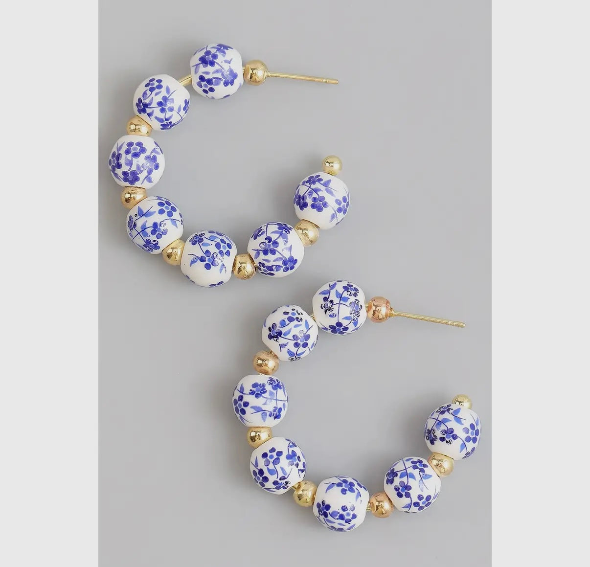 Blue and white beaded hoops