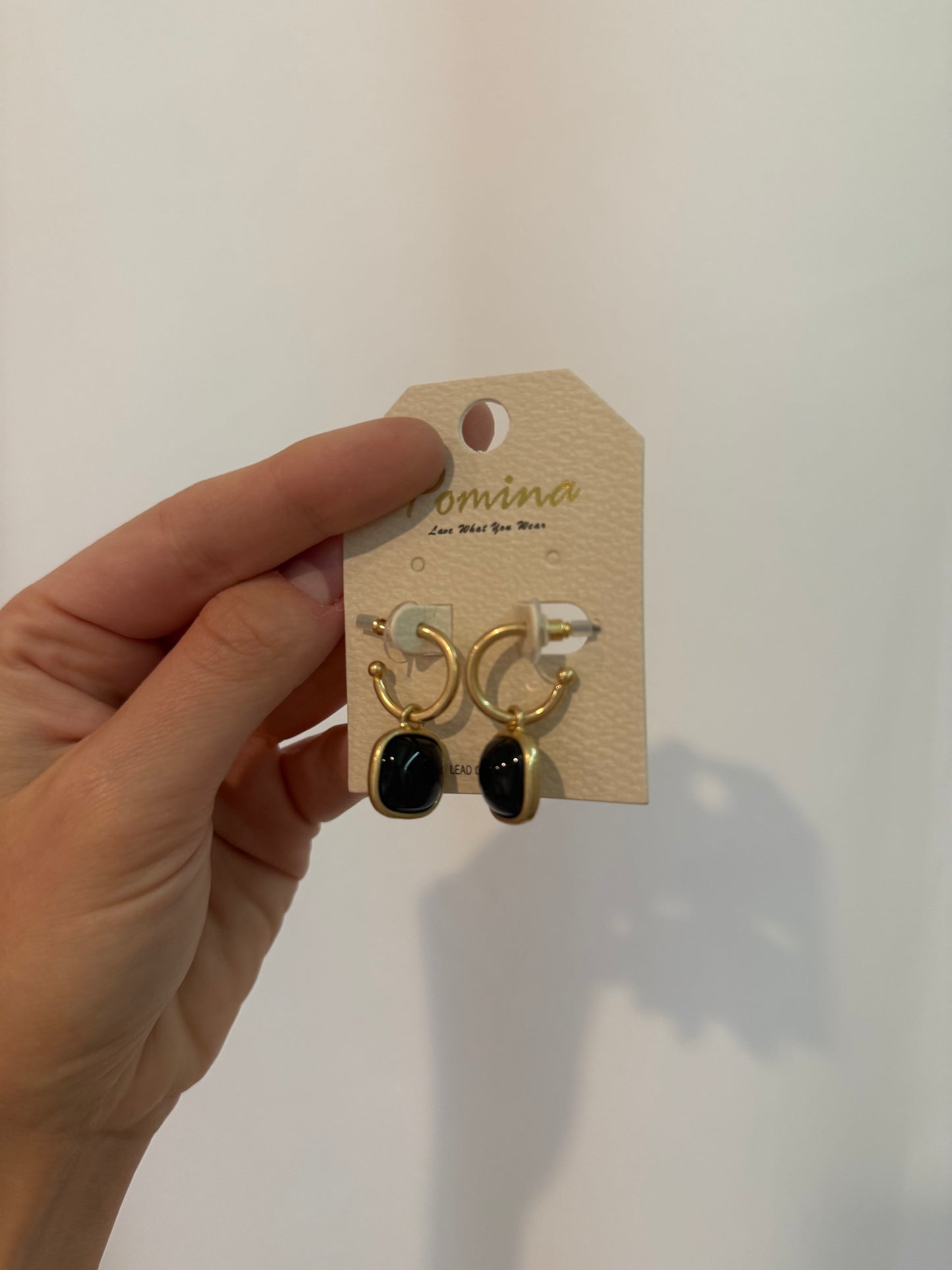 Black and gold charmed hoops