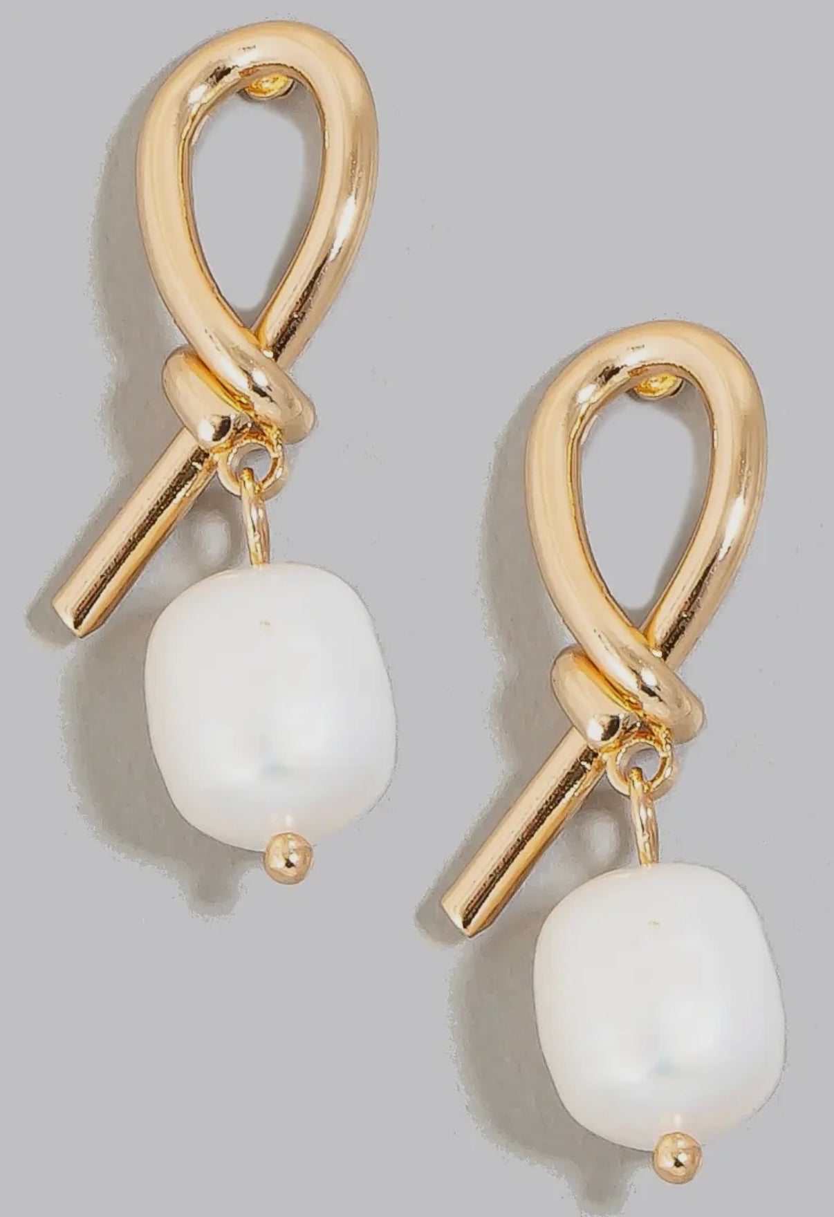 Gold knot and pearl earrings