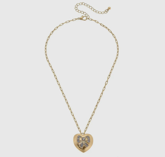 Gold heart and bow necklace