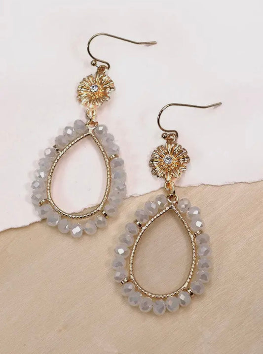 White beaded oval earrings