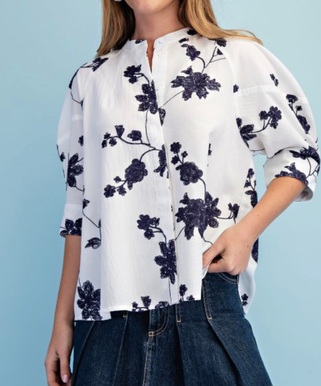 White and navy embroidered top