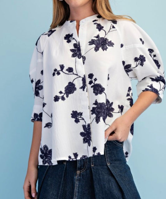 White and navy embroidered top