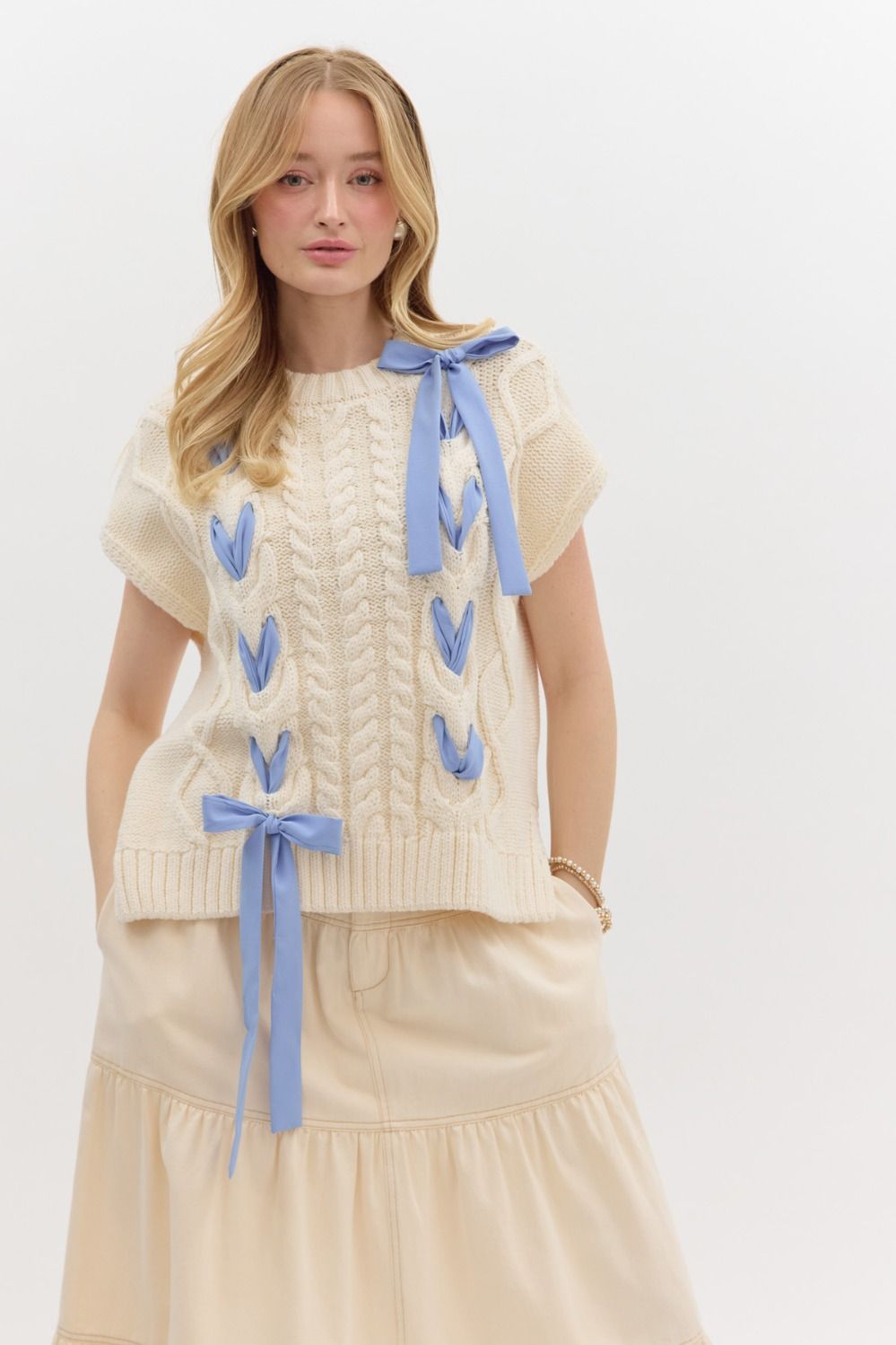 Cream and blue bow sweater