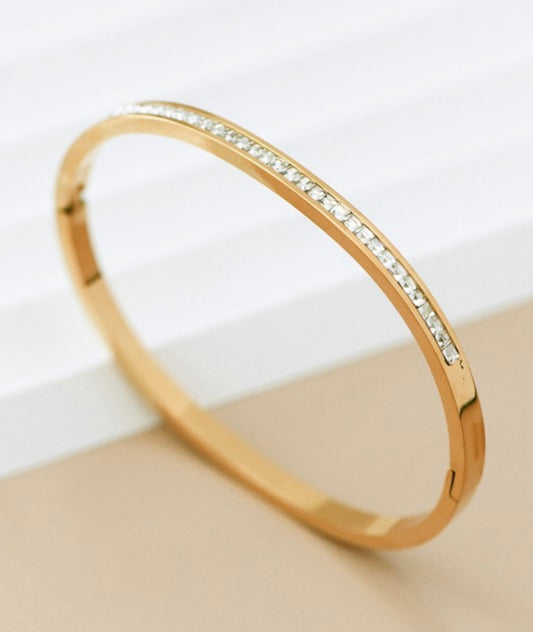 Gold bracelet with rhinestones