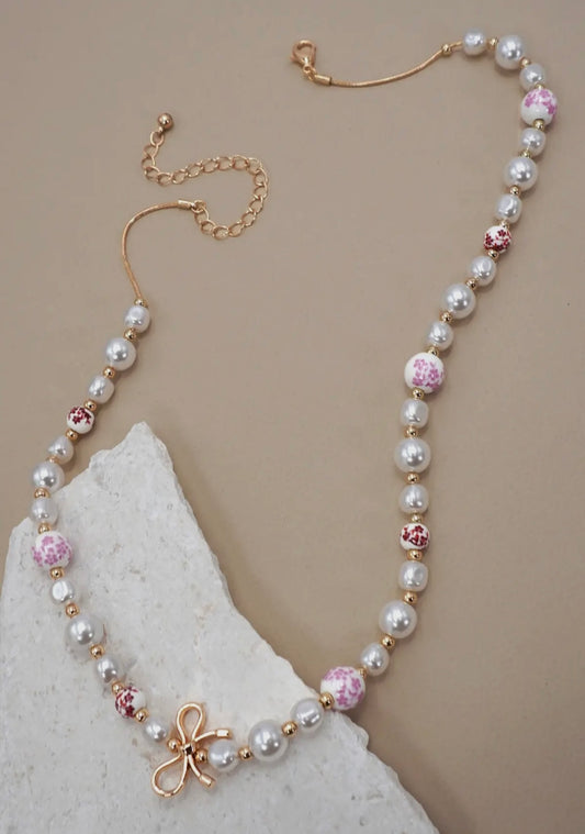 Pink and white bow necklace