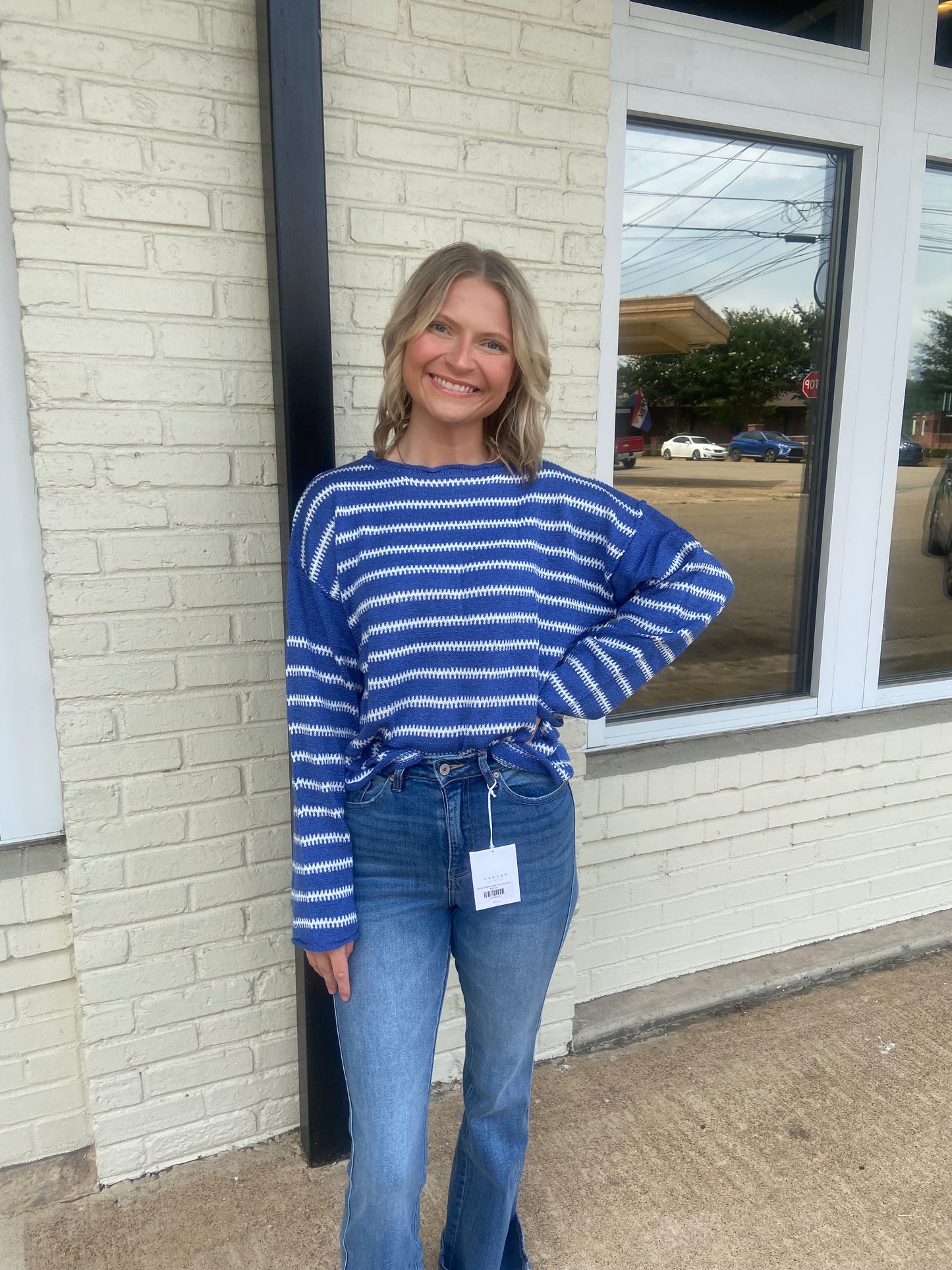 Blue and white striped sweater