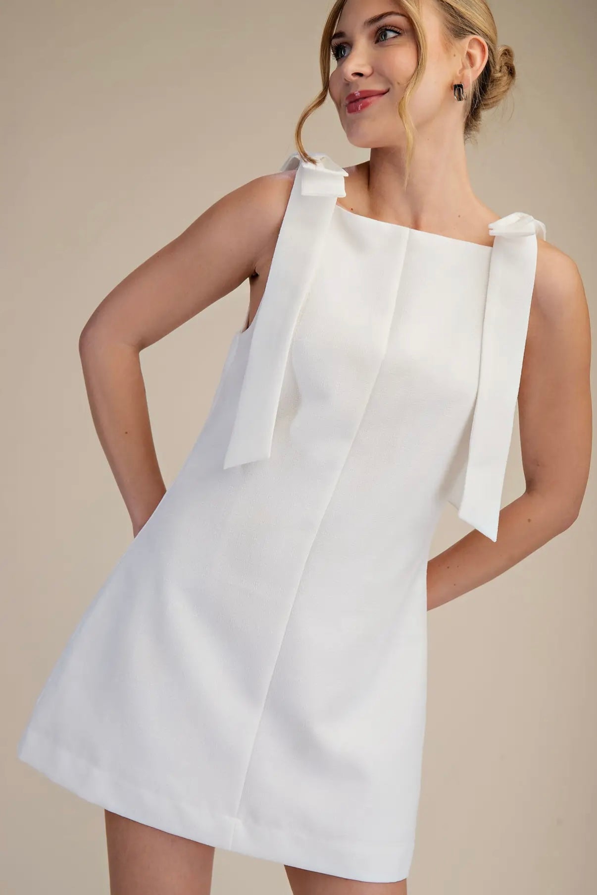 White bow strap dress