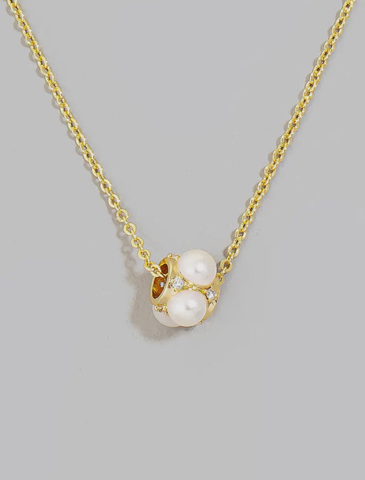 Pearl and rhinestone gold necklace