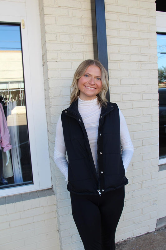 Black puff vest