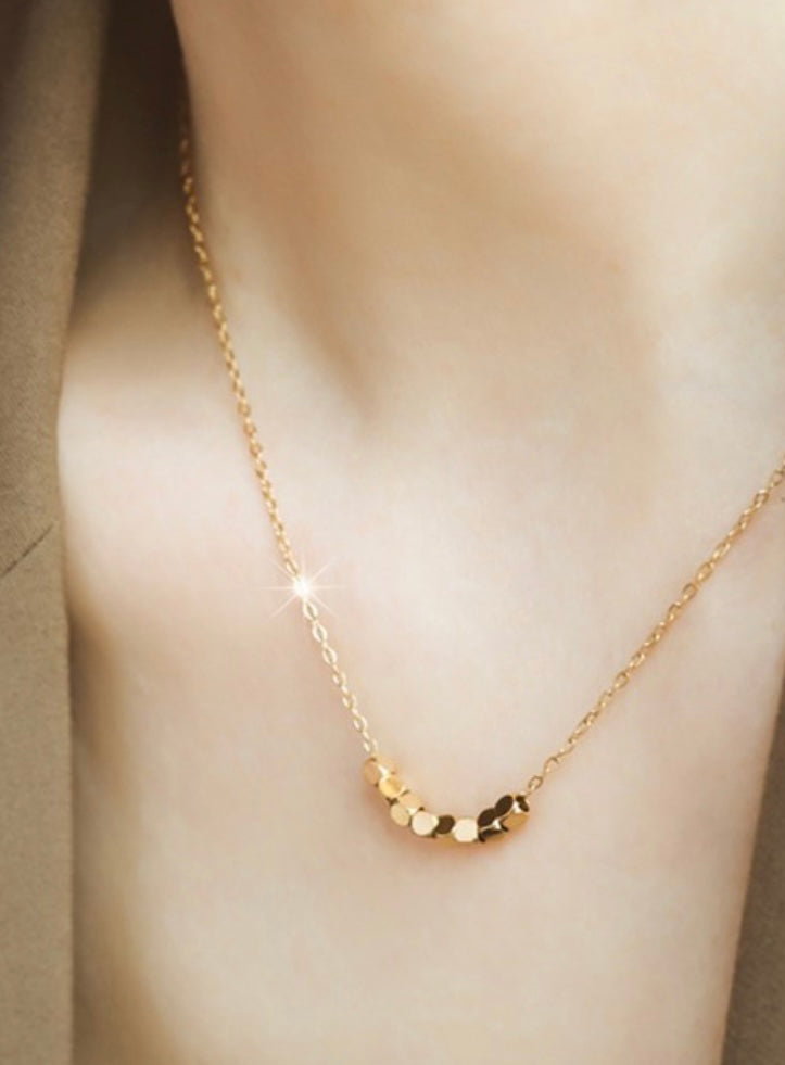 Gold charms necklace