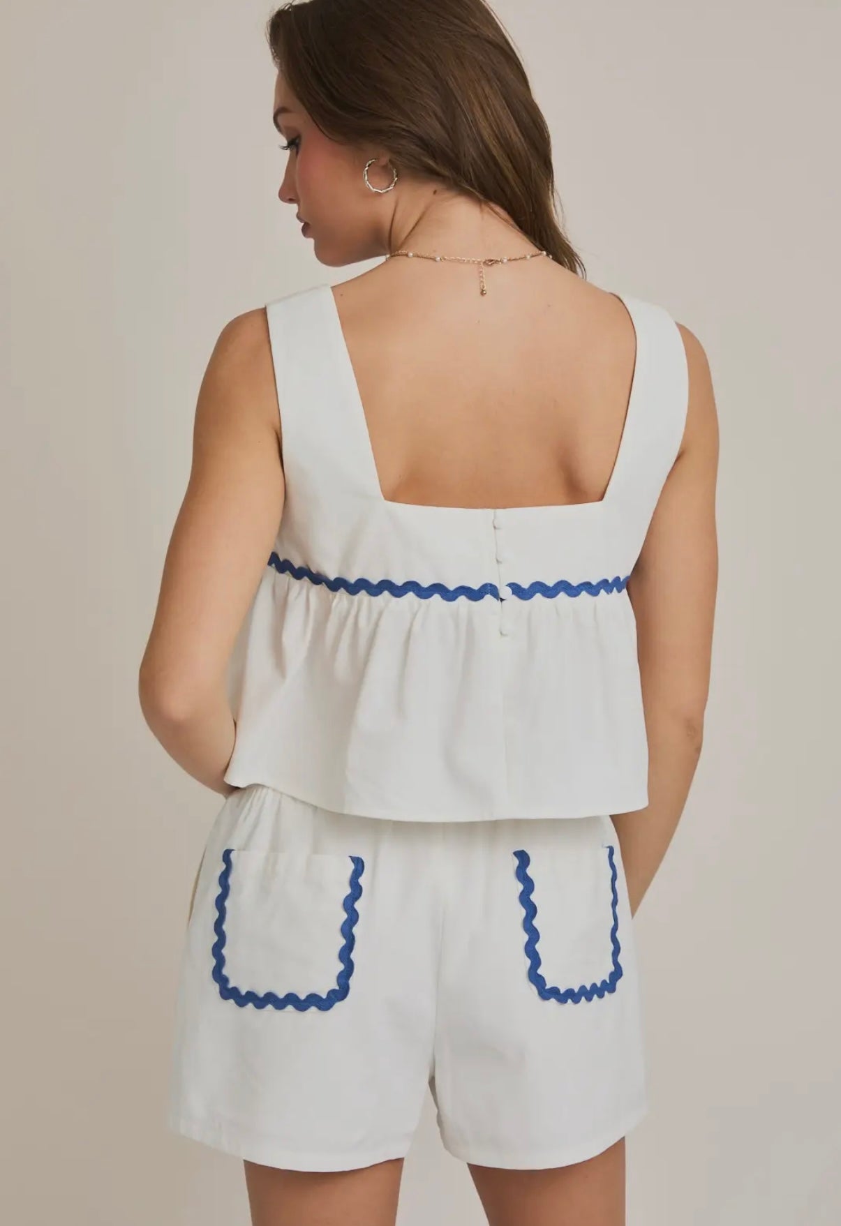 White and blue seashell shorts