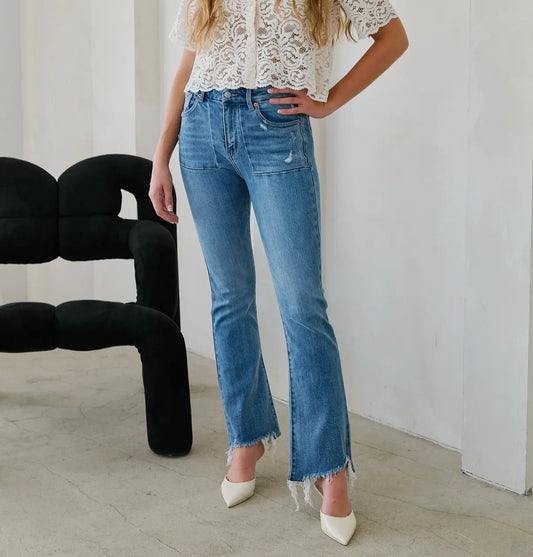 Distressed hem tummy control jeans