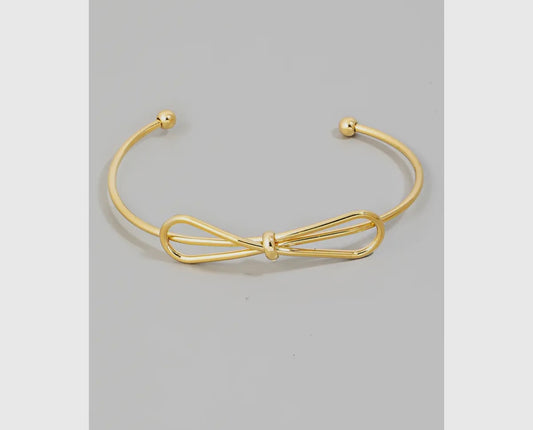 Gold bow cuff bracelet