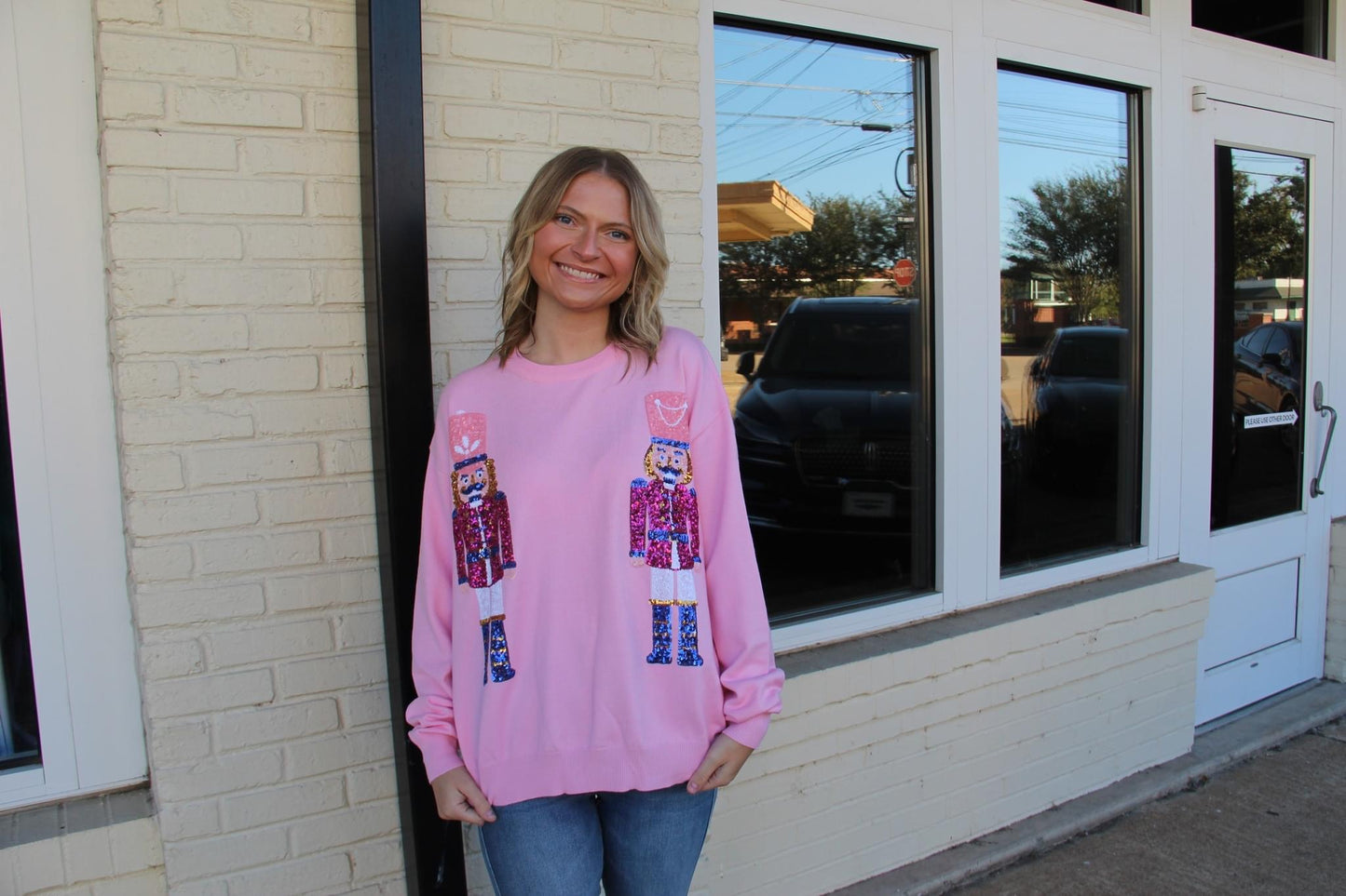 Pink nutcracker sweater