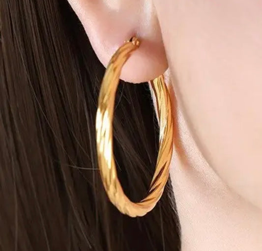 Gold twisted hoops
