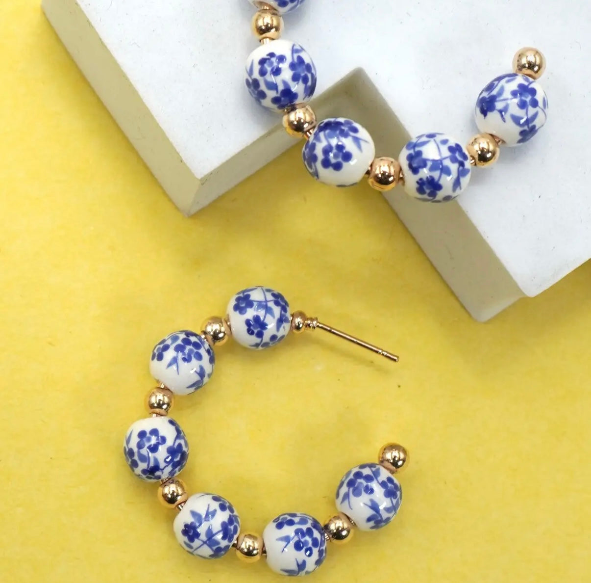 Blue and white beaded hoops