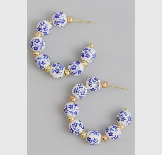 Blue and white beaded hoops