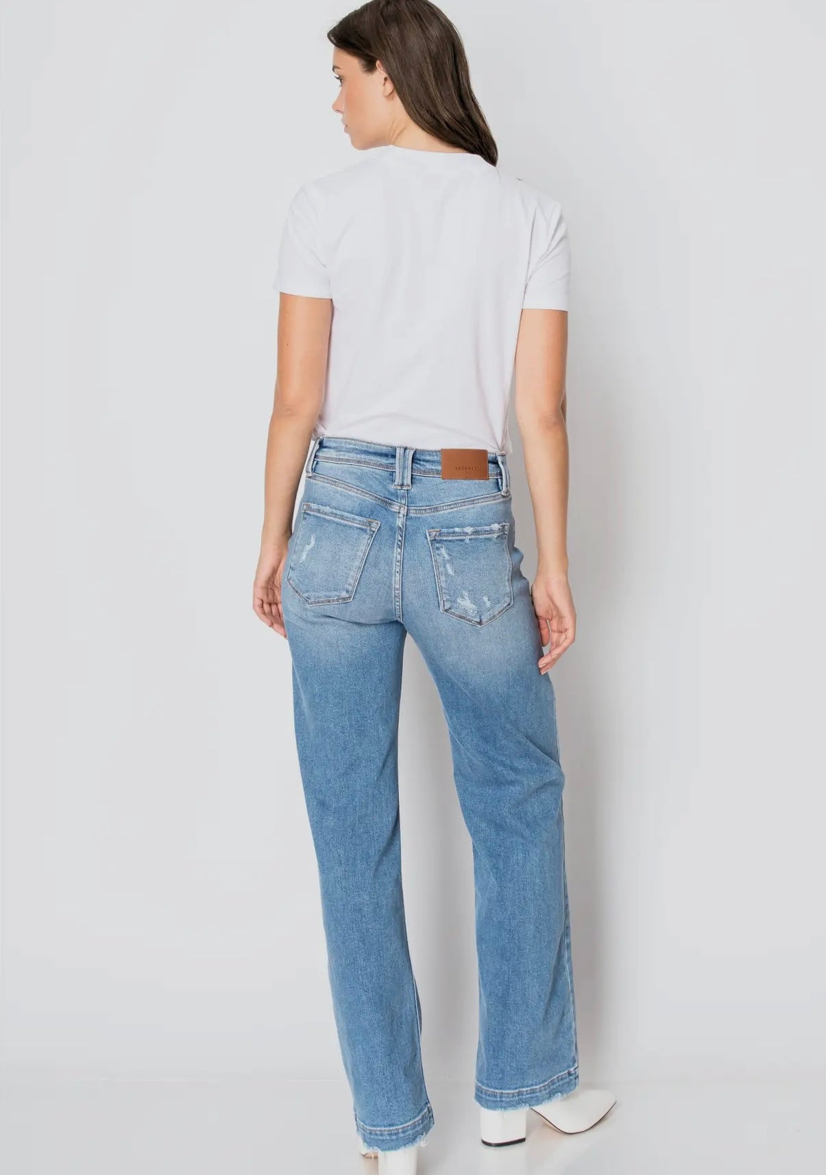 Light wash distressed tummy control jeans