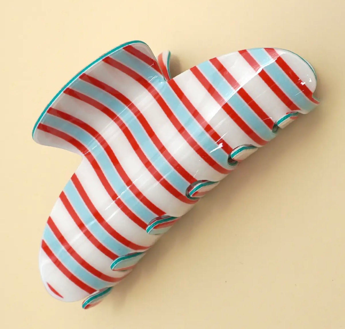 Red and blue striped hair clip