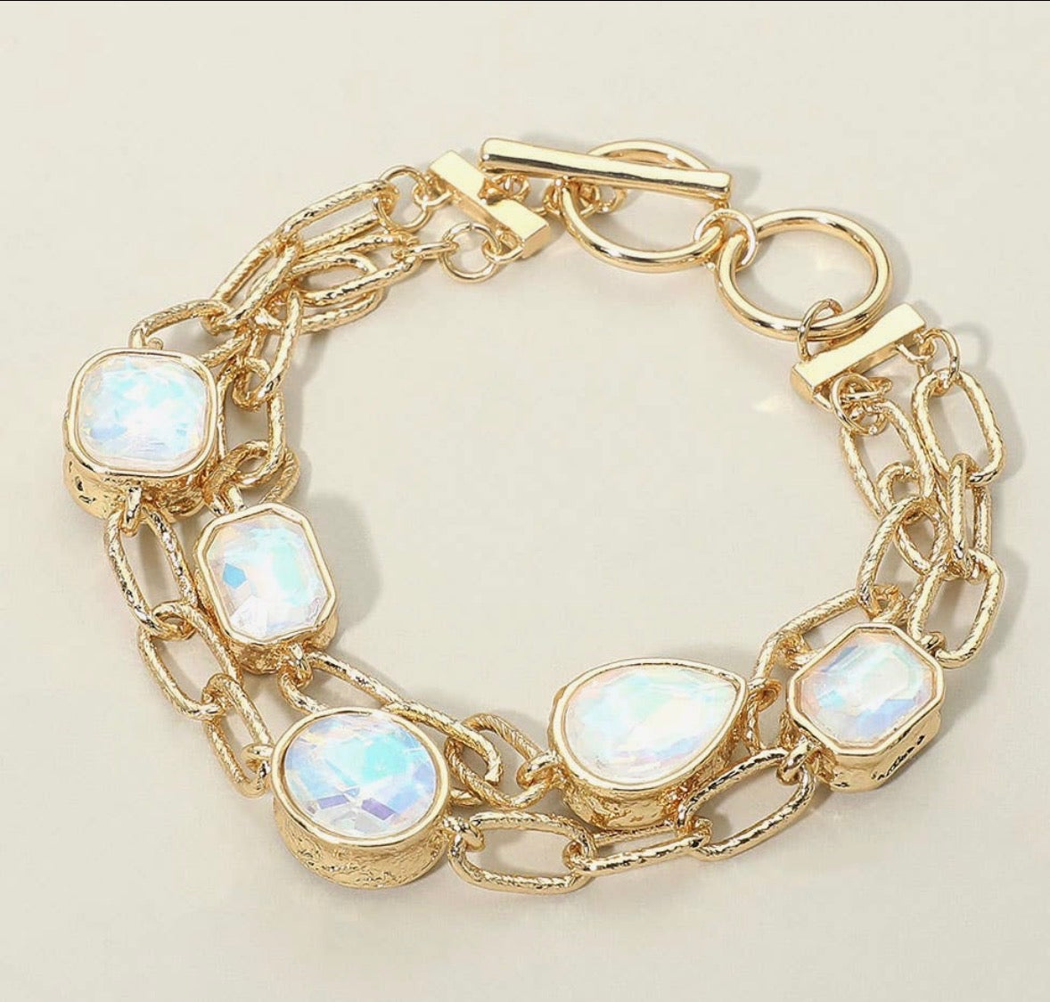 Gold and stone bracelet