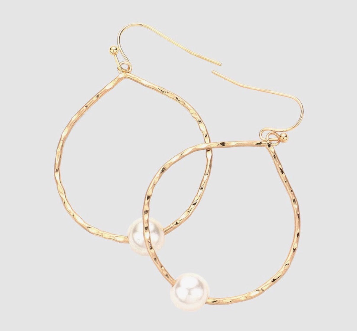 Gold single pearl earrings