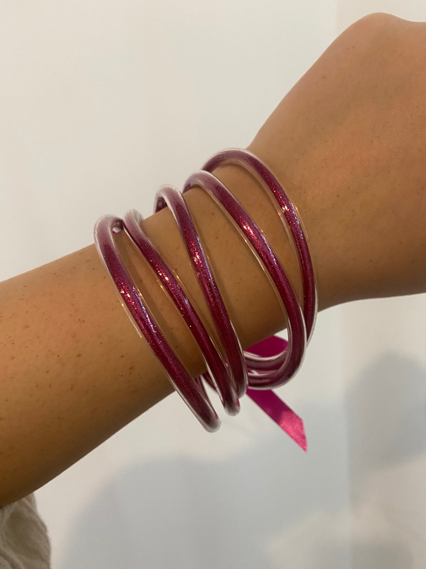 Fuchsia jelly glitter bangles