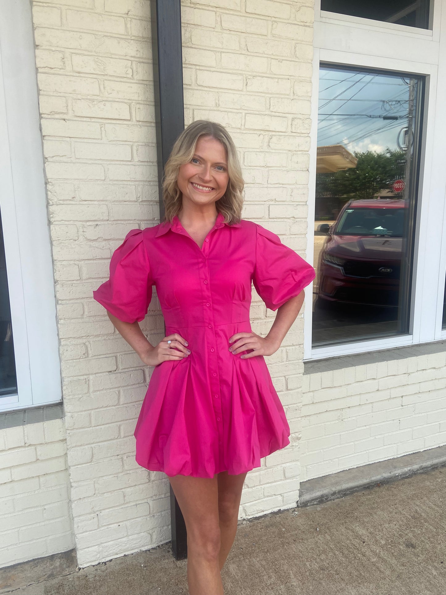 Pink button up bubble hem dress