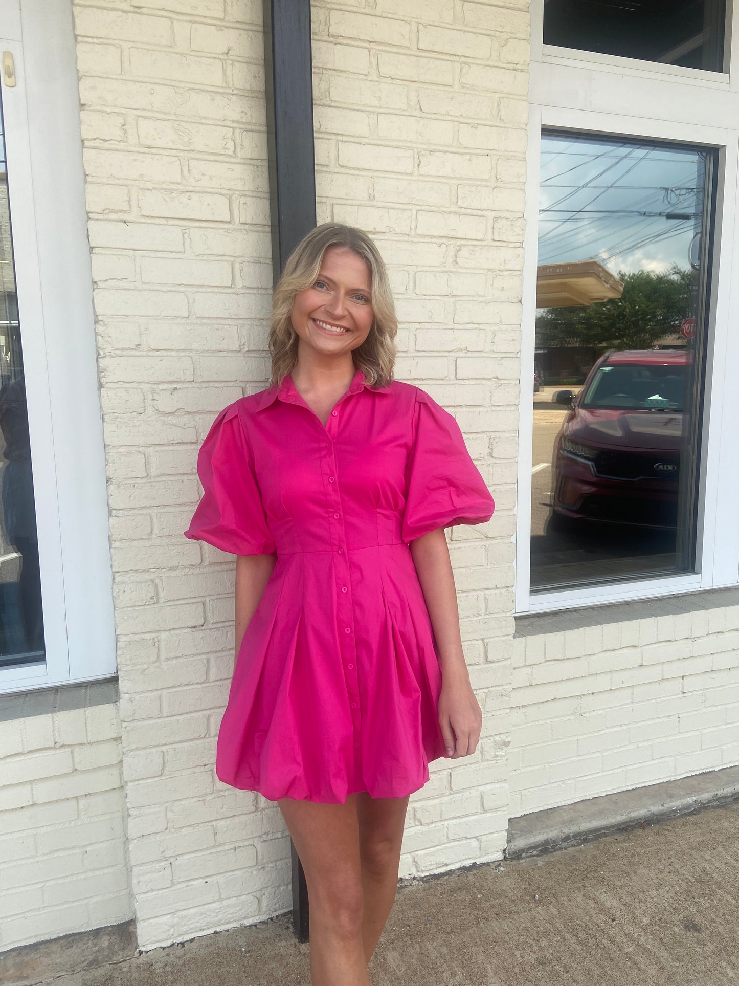 Pink button up bubble hem dress