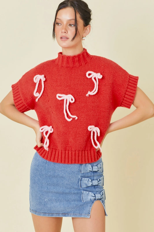 Red and pink bow sweater