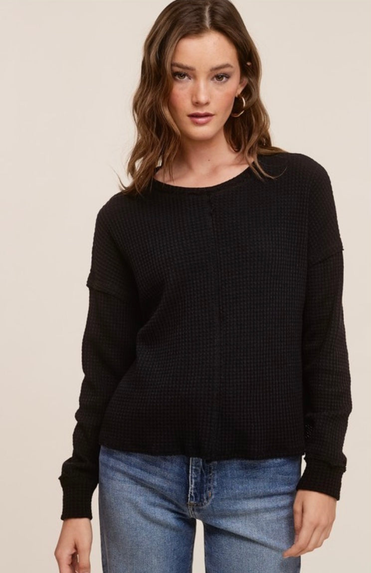 Black waffle knit long sleeve top