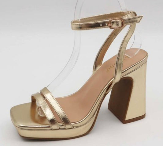Gold strappy heels
